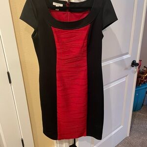 Super slenderizing size 12 dress. Beautiful red/black combo. Loved this dress !